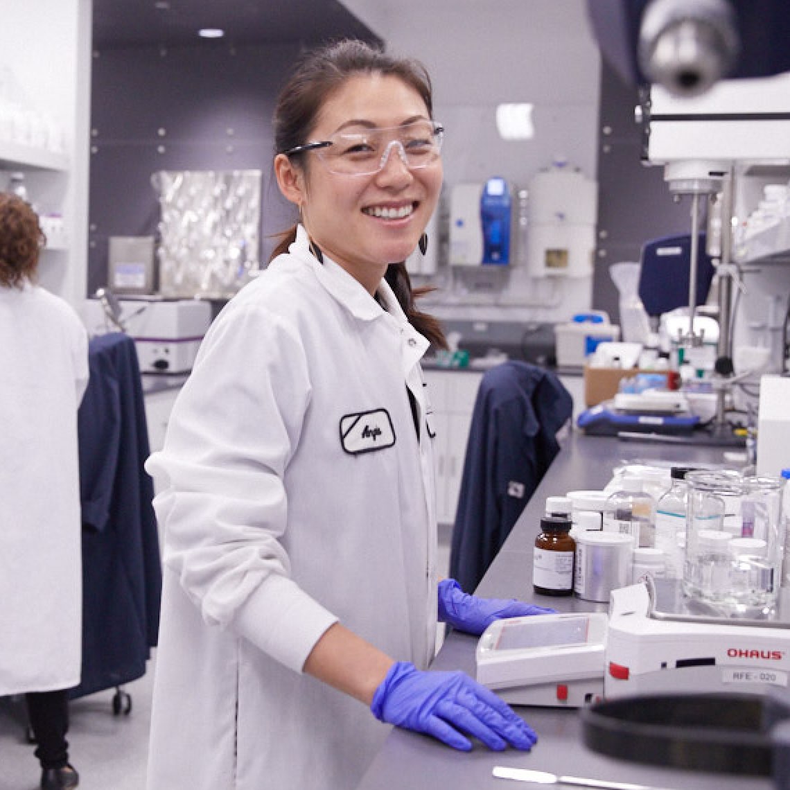 Chemist in lab at work. Chemist in lab at work.